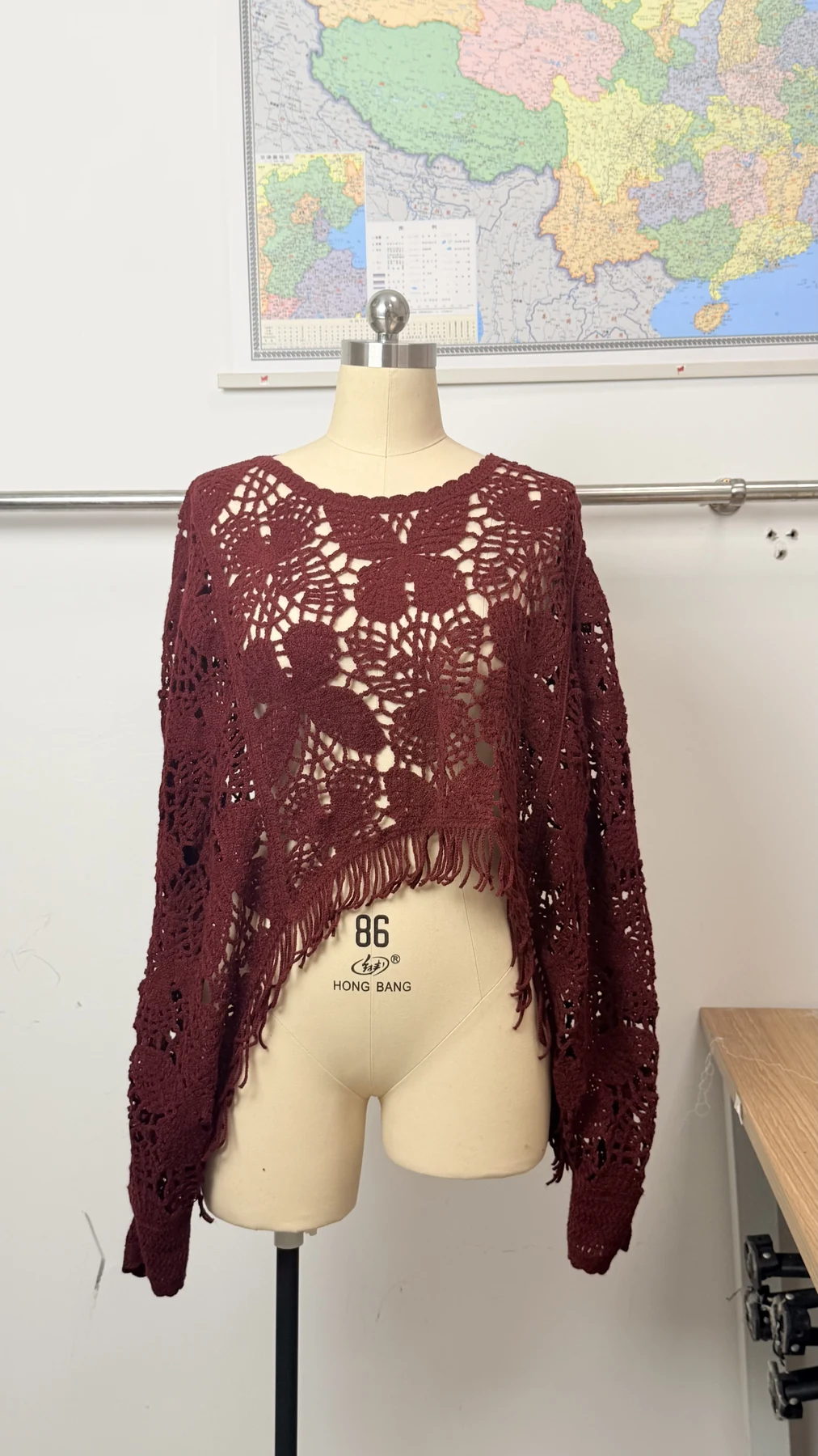 Wholesale Burgundy Asymmetric Crochet-Look Poncho Top for OEM and private label production