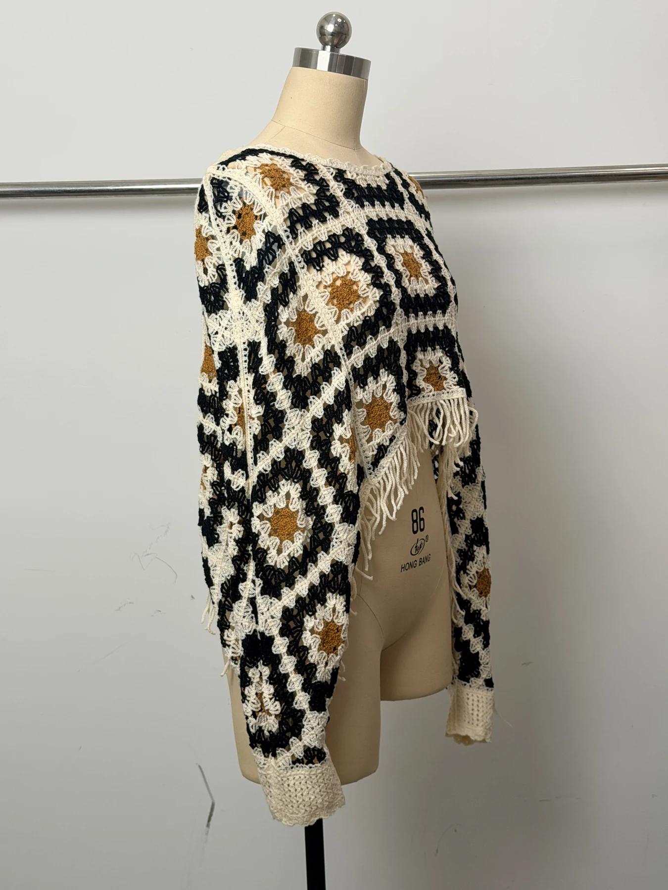 Wholesale Black Ivory Geometric Fringe Crochet-Look Poncho for OEM and private label production 3
