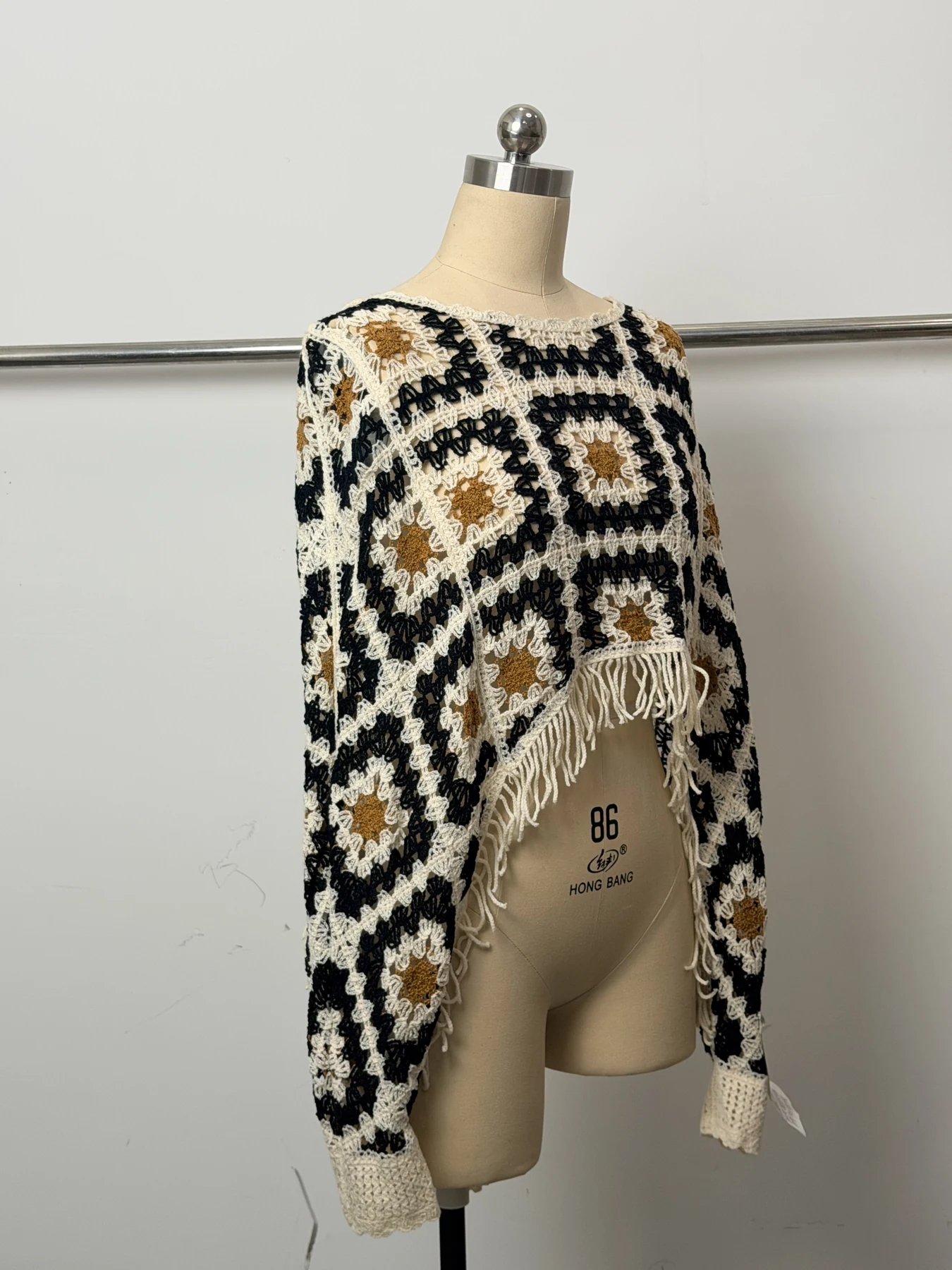 Wholesale Black Ivory Geometric Fringe Crochet-Look Poncho for OEM and private label production 4
