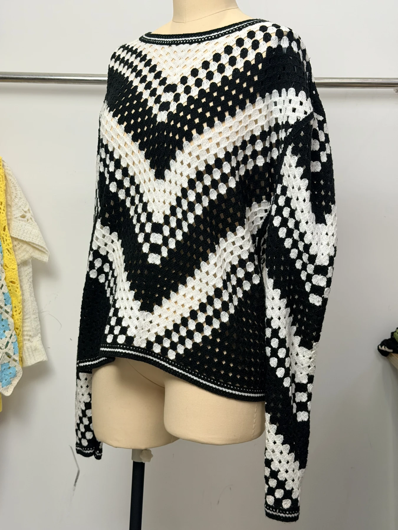 Wholesale Black Ivory Chevron Crochet-Look Poncho Sweater for OEM and private label production 2
