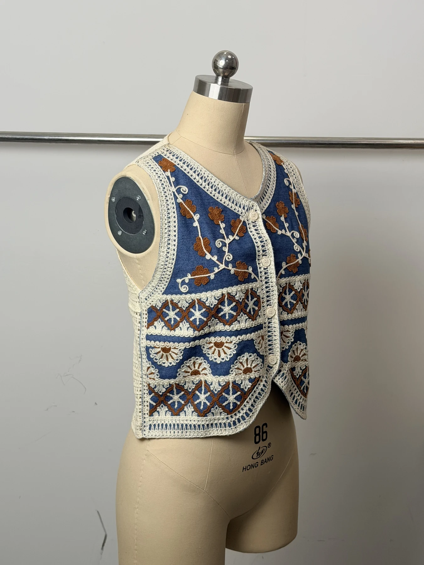 Wholesale Blue Rust Floral Crochet-Look Button Vest for OEM and private label production 4
